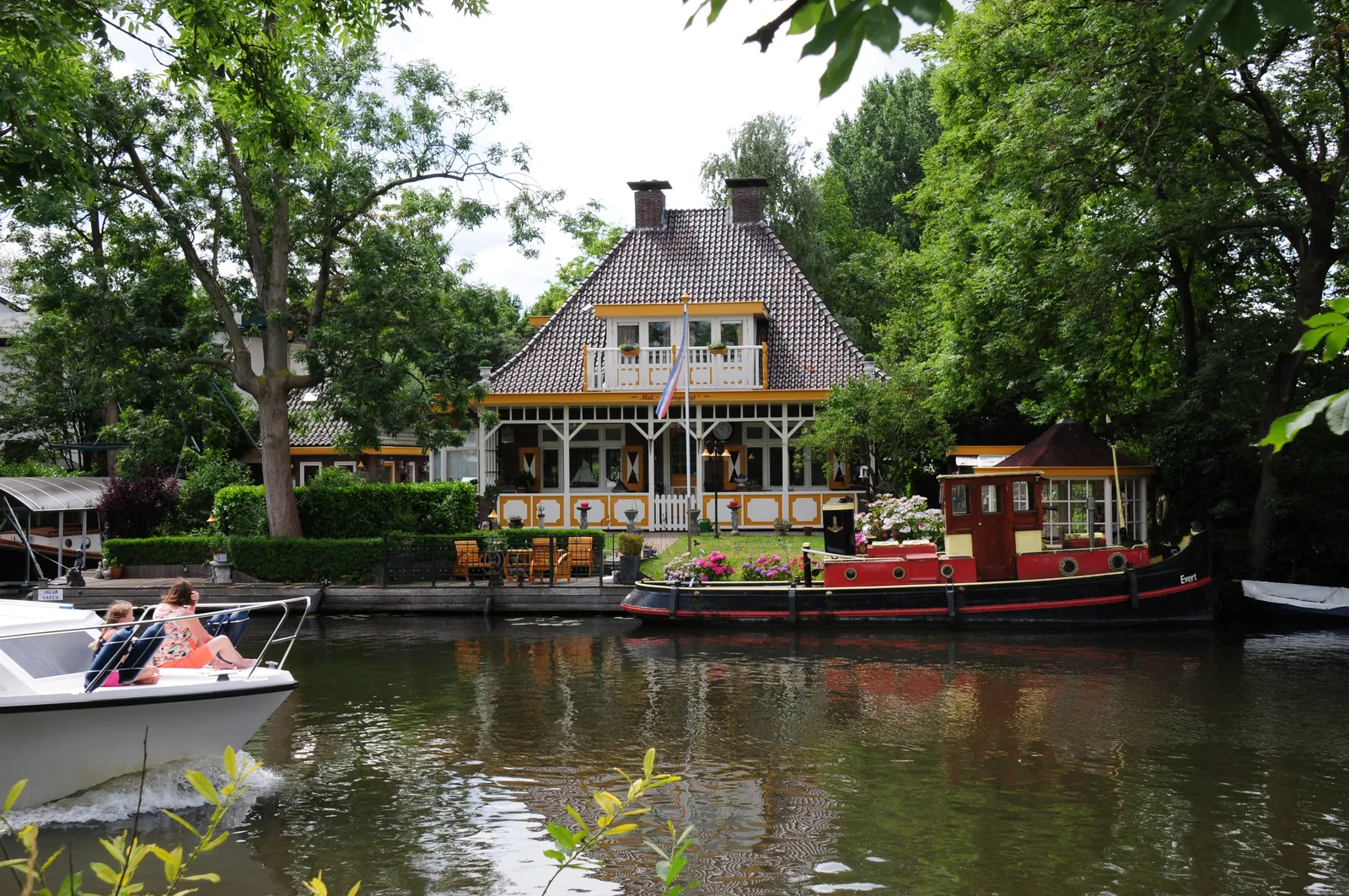 Dutch river and polder landscape with waterways, classic windmill country near Amsterdam